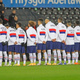 The USMNT team lines up before friendly vs. Wales, with social justice messages on their backs.
